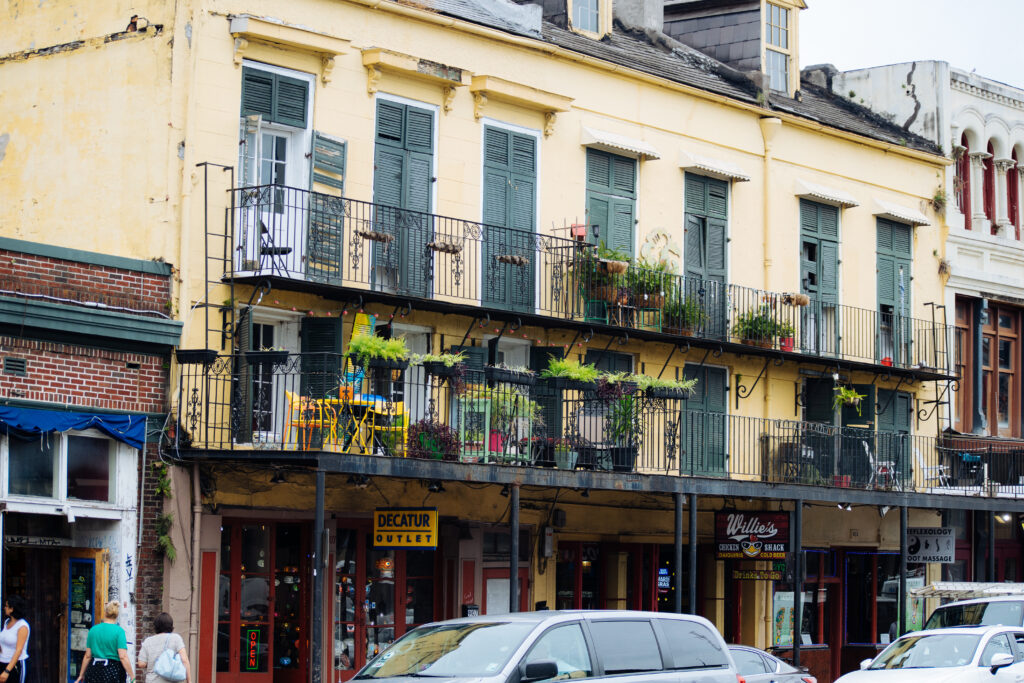 a photo of colonial style buildings in the french quarter - what to do in new orleans in october
