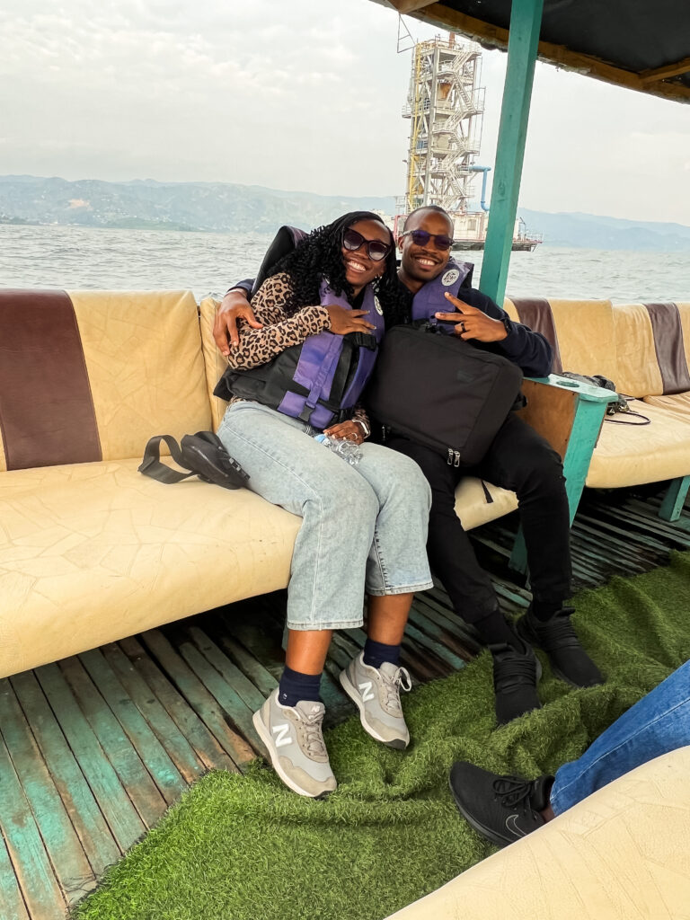 black couple on a boat on lake kivu in rwanda