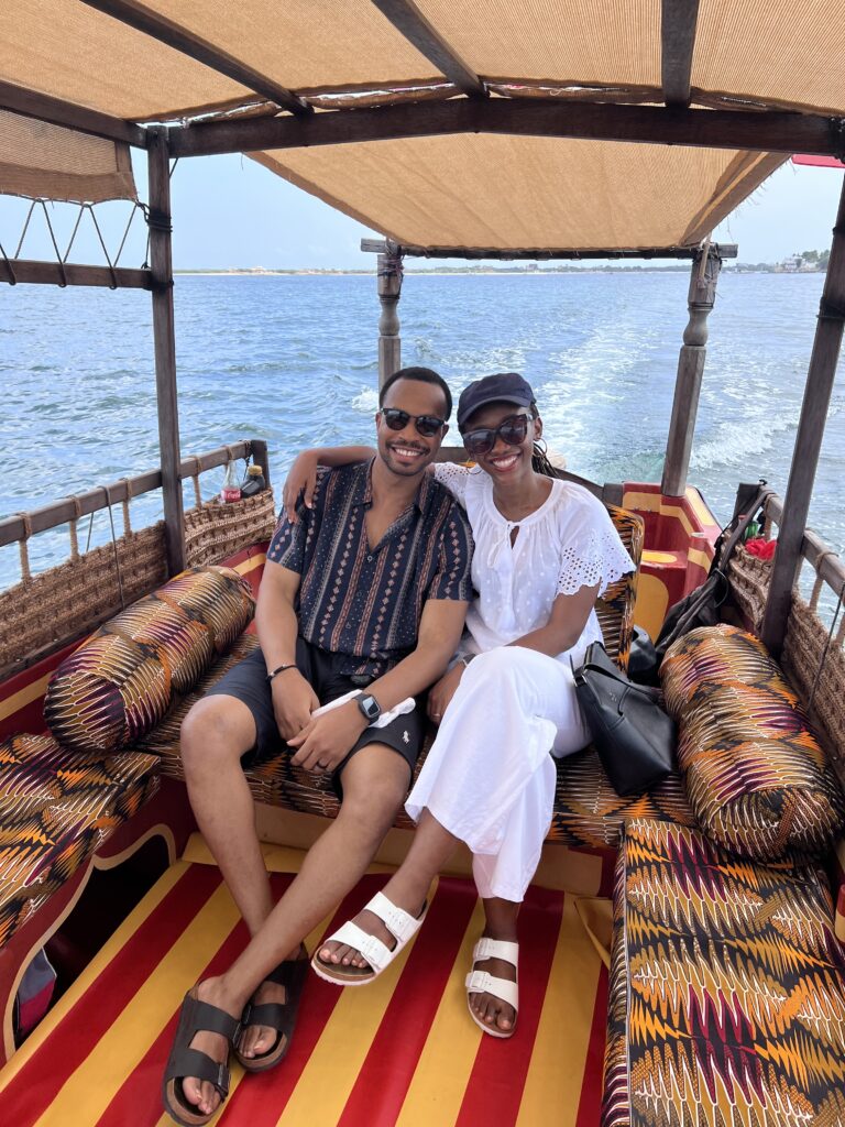 a black couple on a boat in lamu