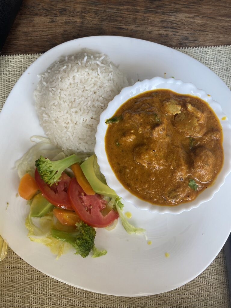 fish curry dish with a side of rice in lamu