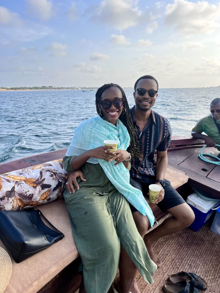 a black couple on a lamu dhow at sunset